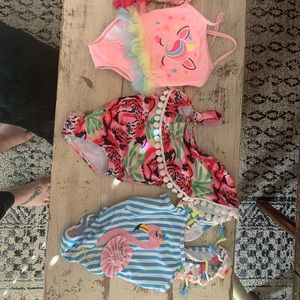 Baby swim suits (2) 3-6 and (2) 6-9